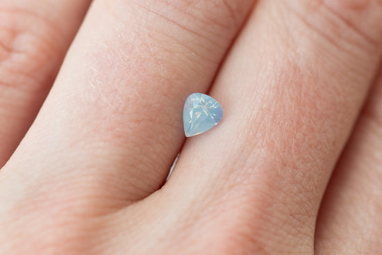 0.65ct Pear Opalescent Light Blue Sapphire