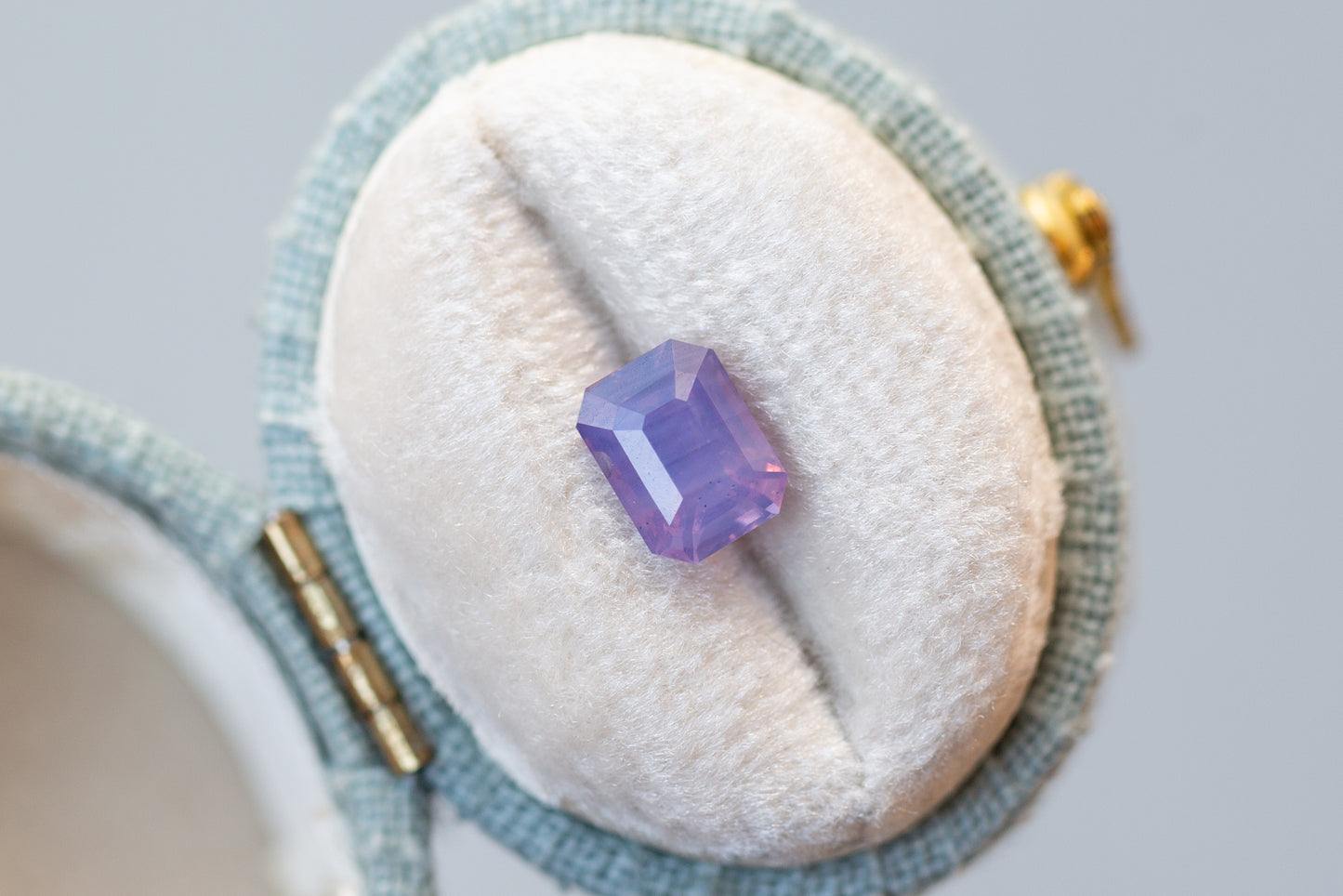 1.52ct Emerald Cut Opalescent Pinkish Purple Sapphire