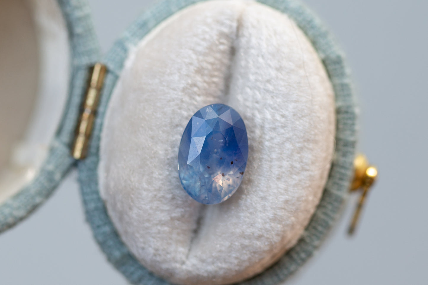 3.12ct Oval Opalescent Periwinkle Peach Sapphire