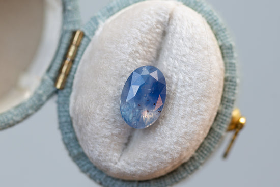 3.12ct Oval Opalescent Periwinkle Peach Sapphire