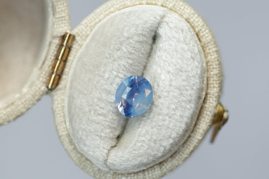 1.69ct Oval Bi-Color Opalescent Blue Sapphire