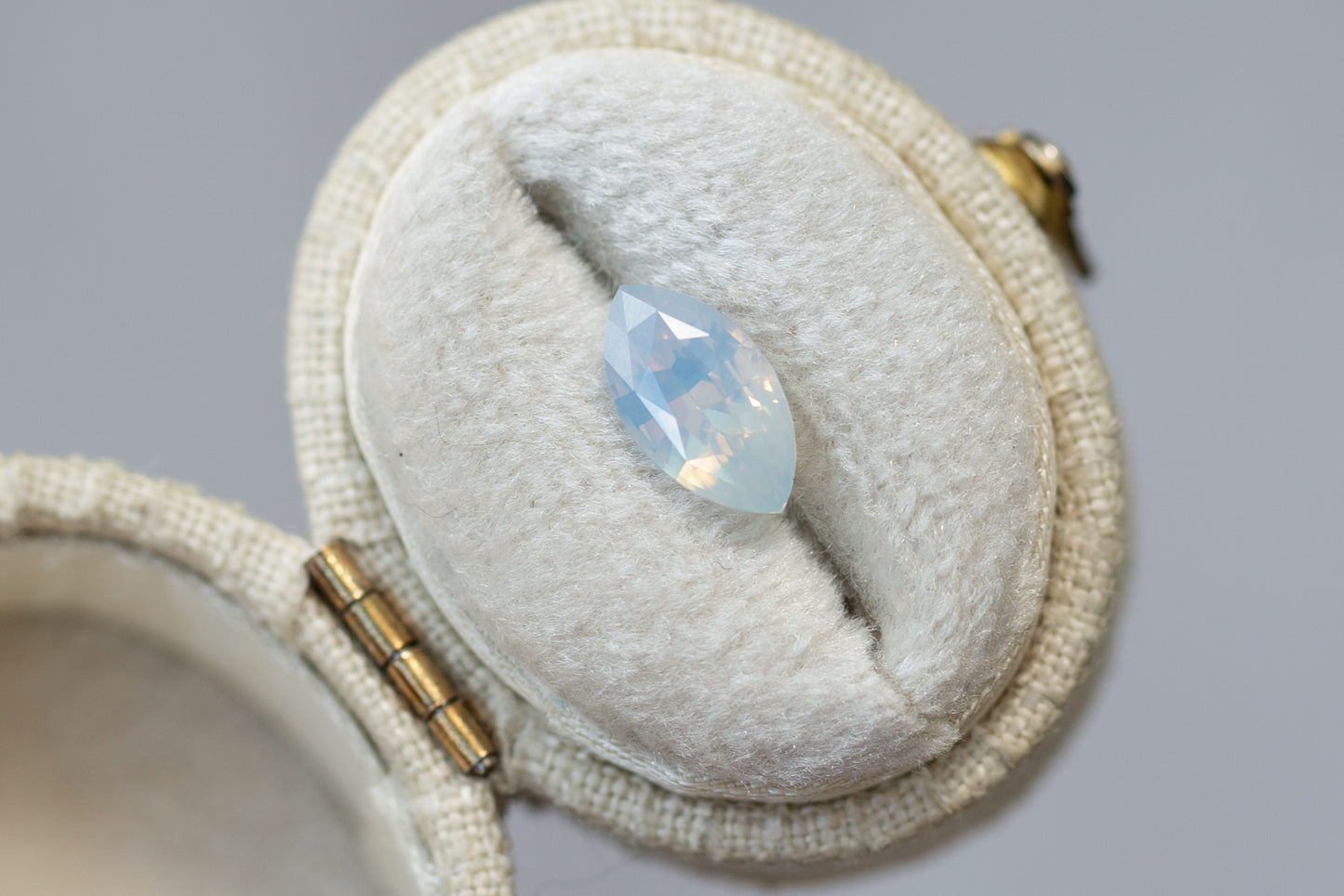 2.02ct Marquise Opalescent Light Blue Peach Sapphire