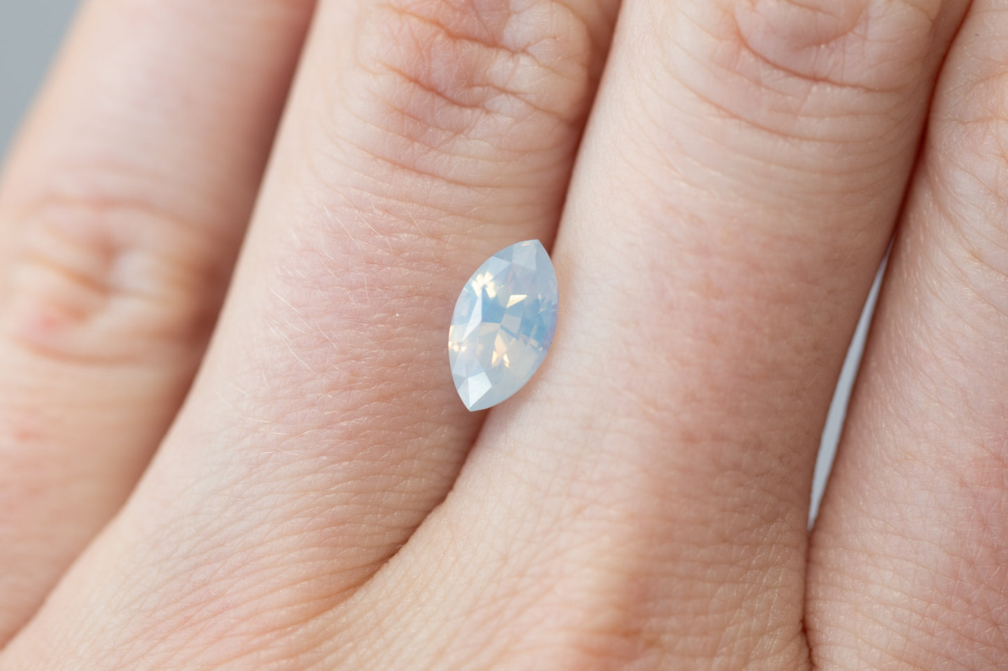 2.02ct Marquise Opalescent Light Blue Peach Sapphire