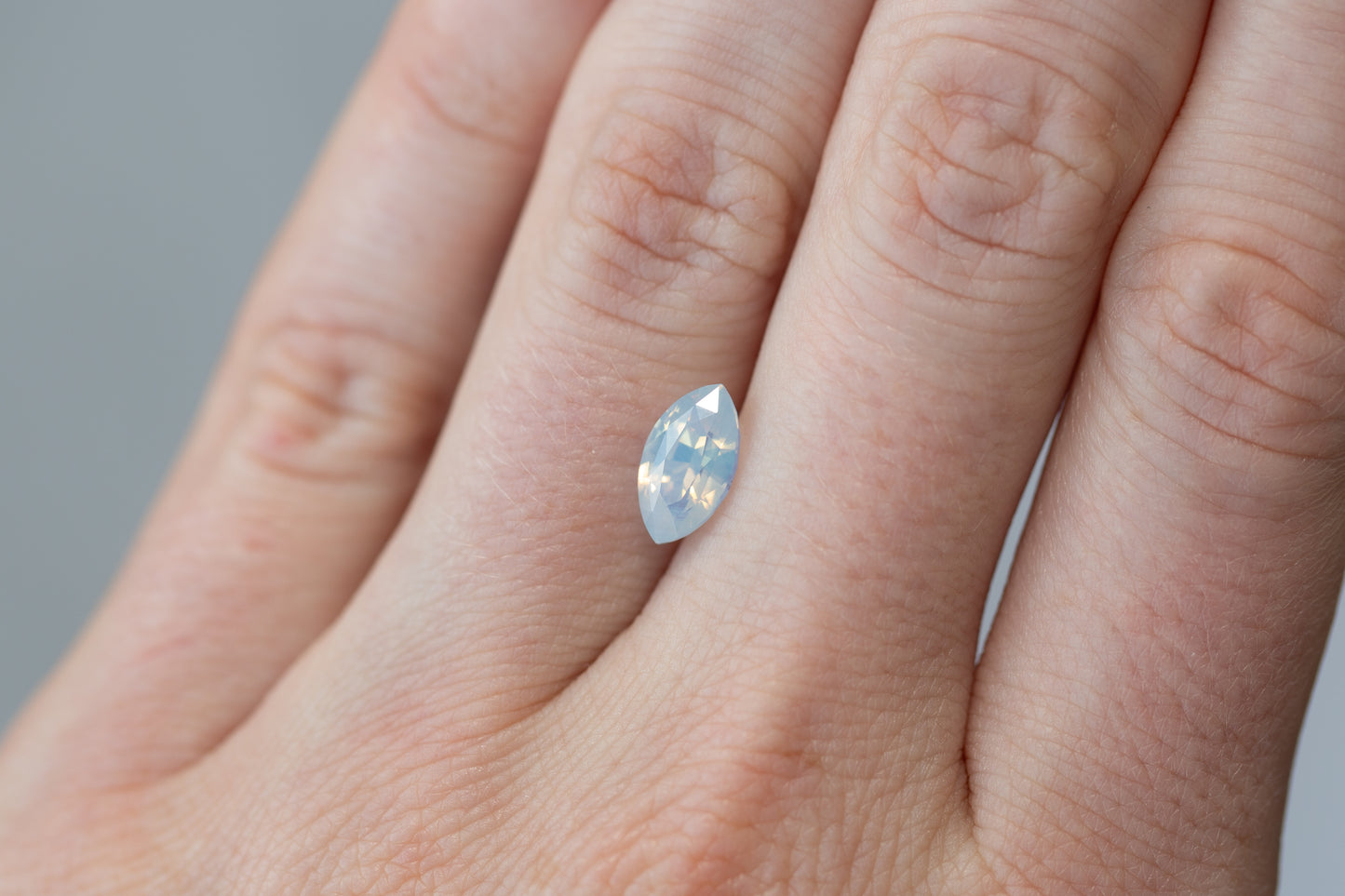 2.02ct Marquise Opalescent Light Blue Peach Sapphire