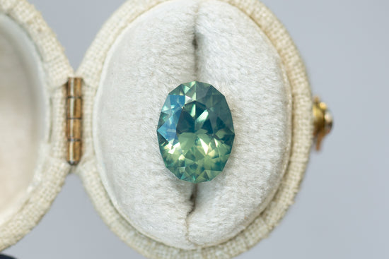 4.50ct Oval Opalescent Aqua Teal Green Sapphire