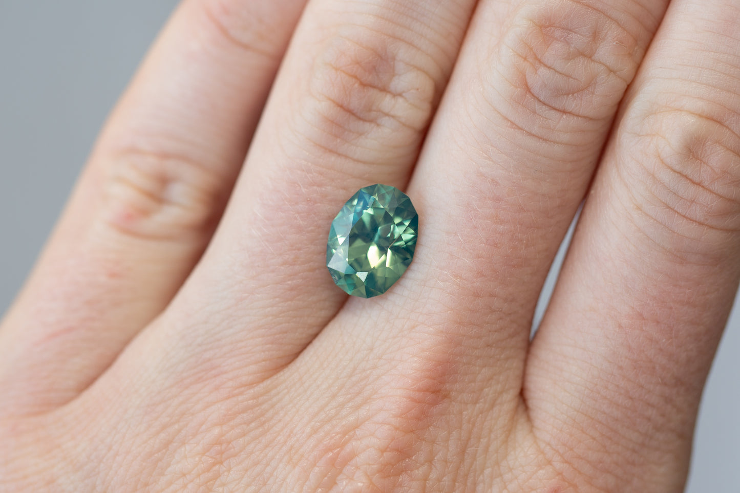 4.50ct Oval Opalescent Aqua Teal Green Sapphire