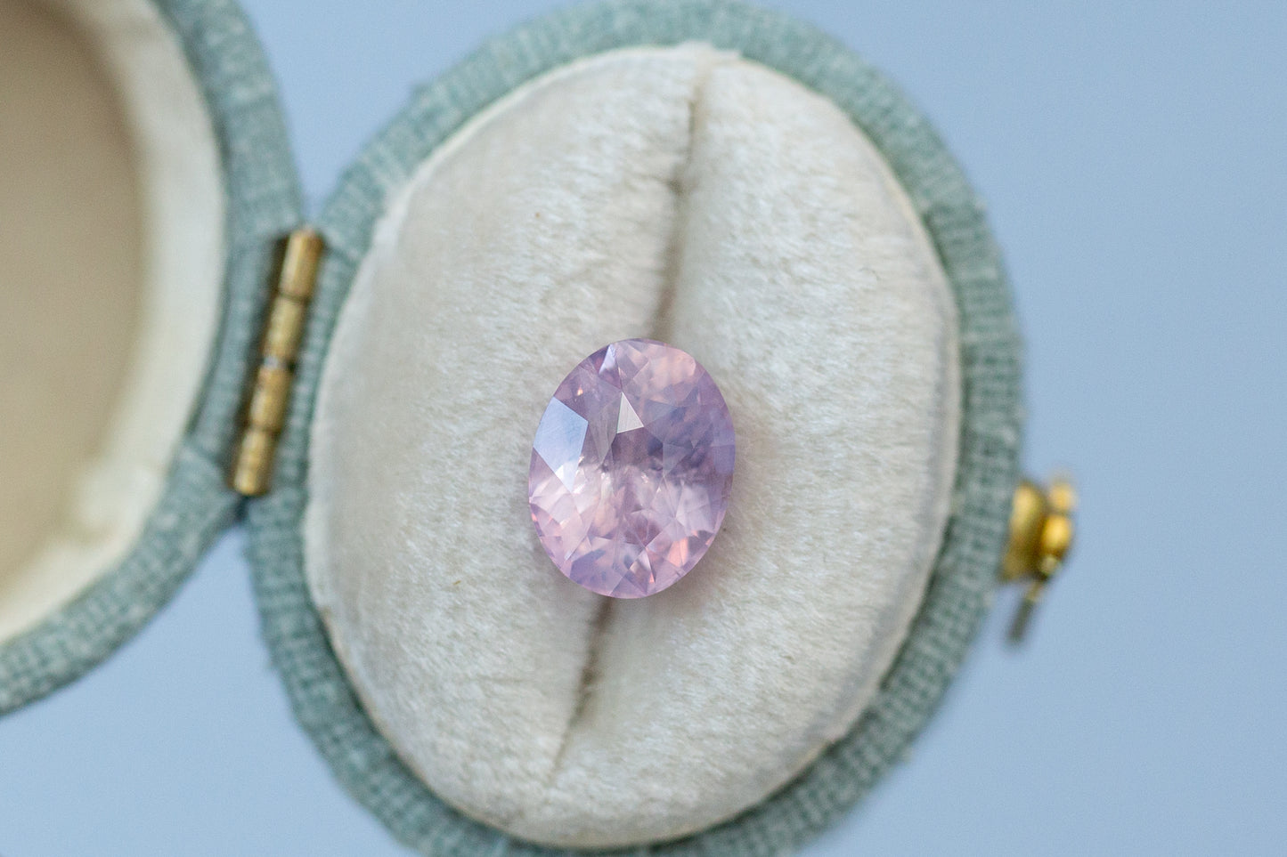 3.07ct Oval Smoky Peach Purple Sapphire