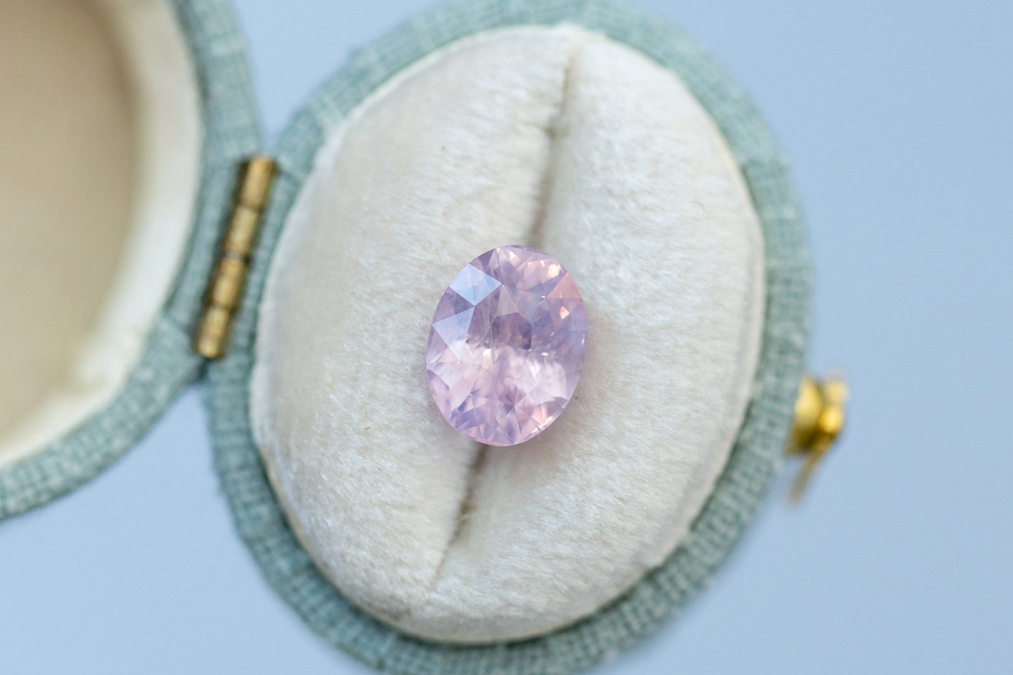 3.07ct Oval Smoky Peach Purple Sapphire