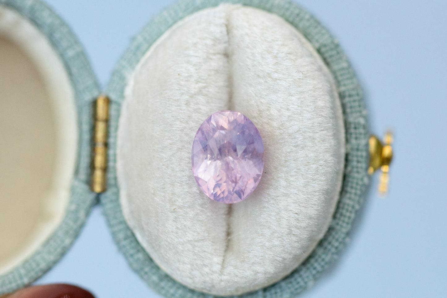 3.07ct Oval Smoky Peach Purple Sapphire