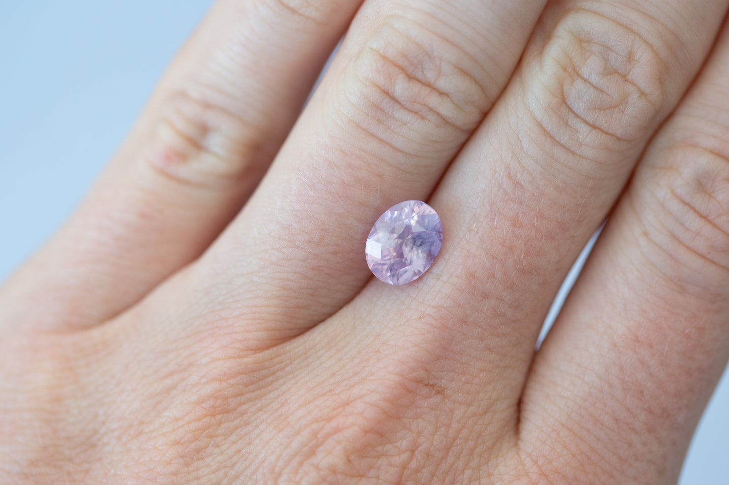 3.07ct Oval Smoky Peach Purple Sapphire