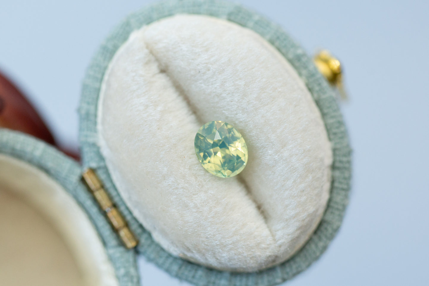 1.05ct Oval Opalescent Yellow Green Teal Sapphire