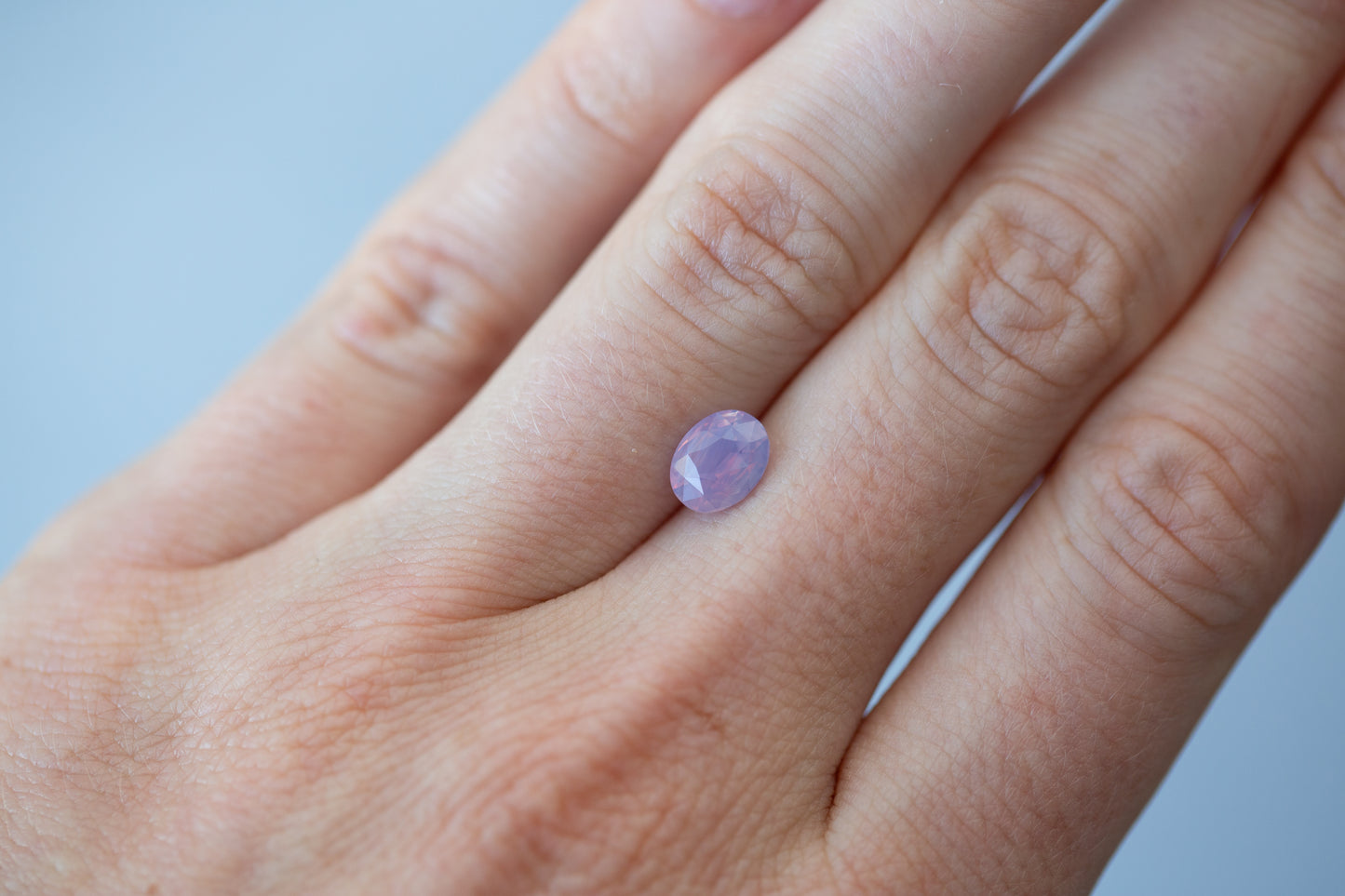 1.52ct Oval Smoky Pink Purple Sapphire