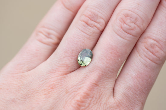 2.52ct Oval Yellowish Green Sapphire