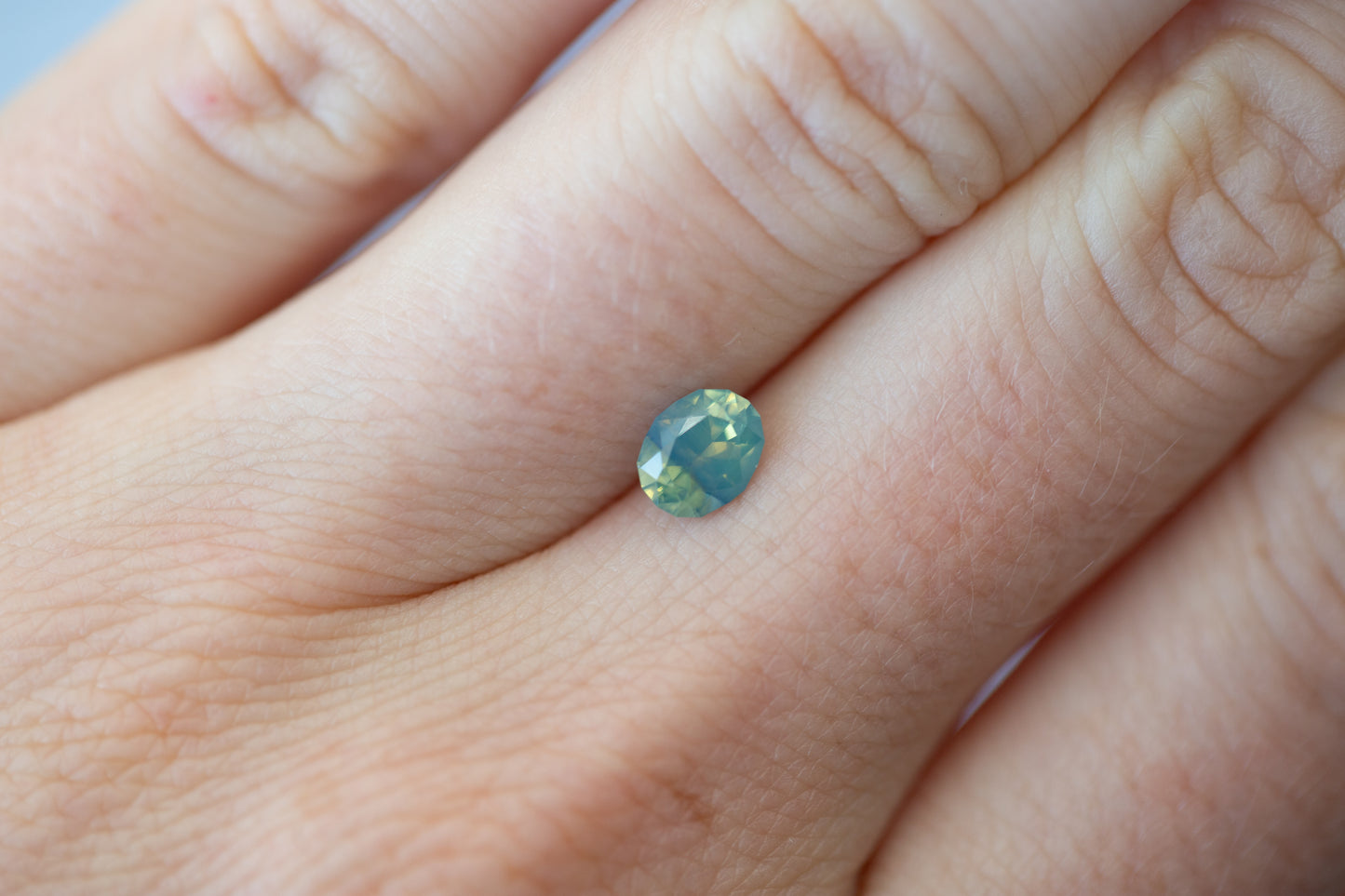 0.81ct Oval Opalescent Teal Blue Green Sapphire