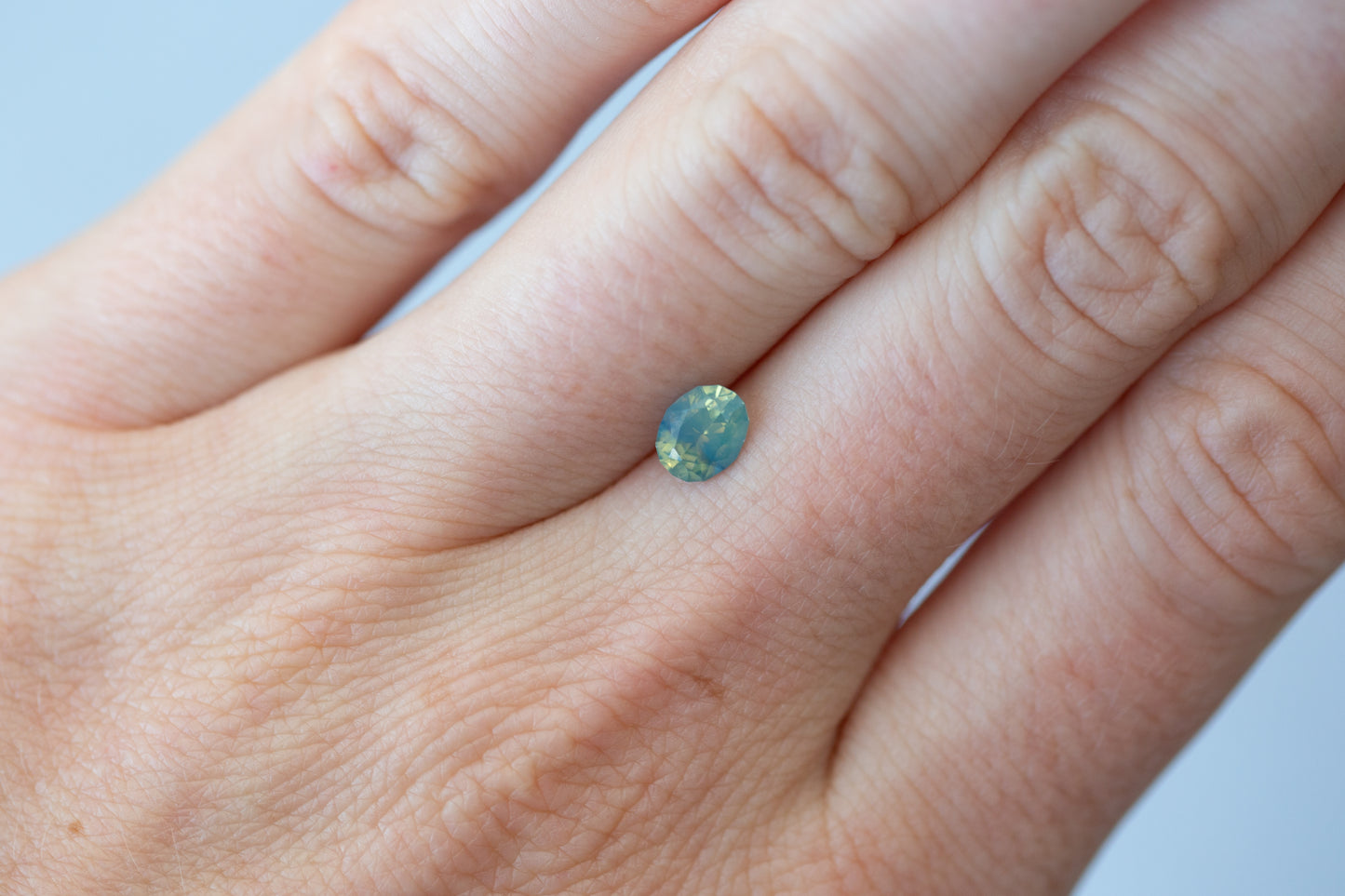 0.81ct Oval Opalescent Teal Blue Green Sapphire