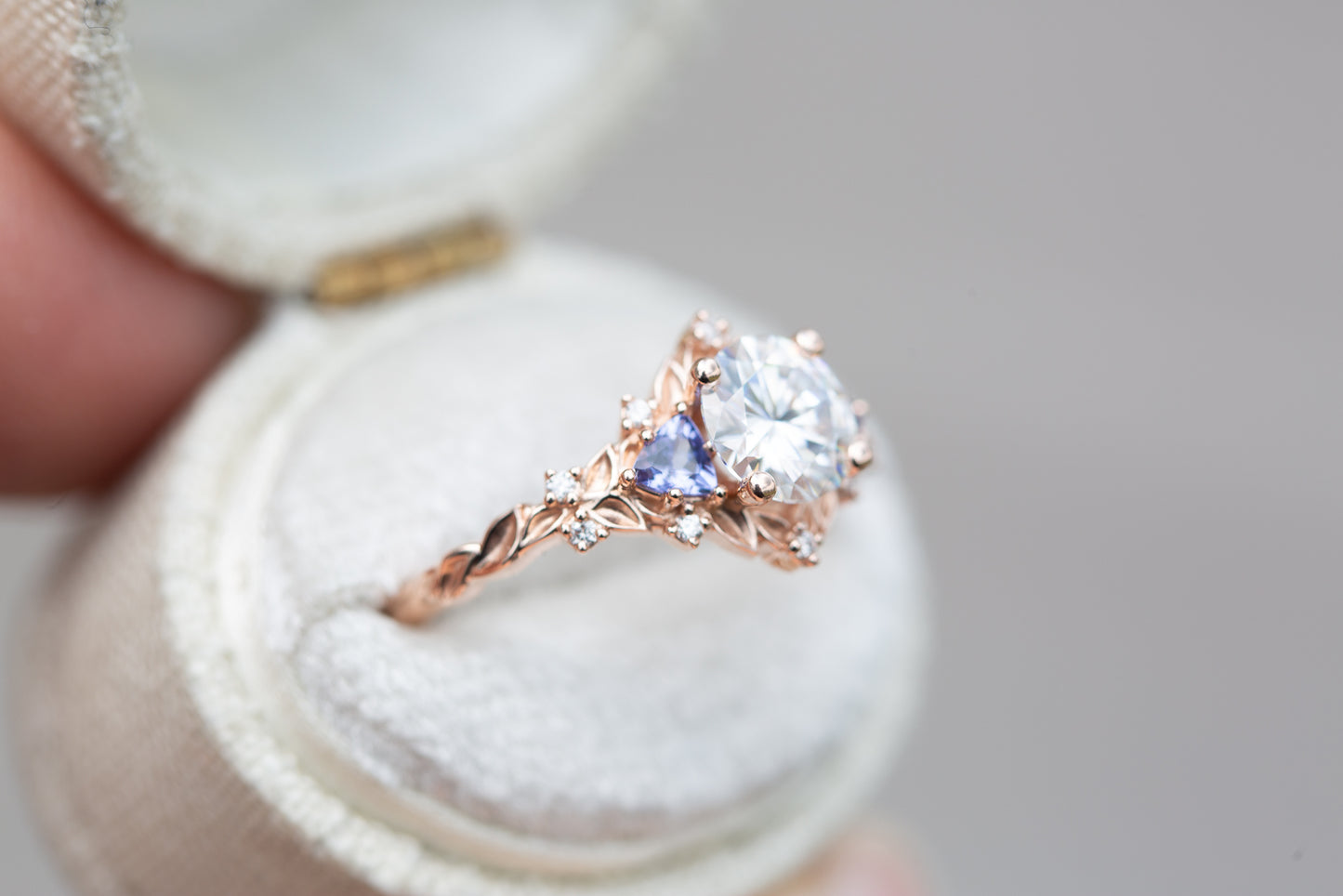 Load image into Gallery viewer, Briar rose three stone with round moissanite and tanzanite
