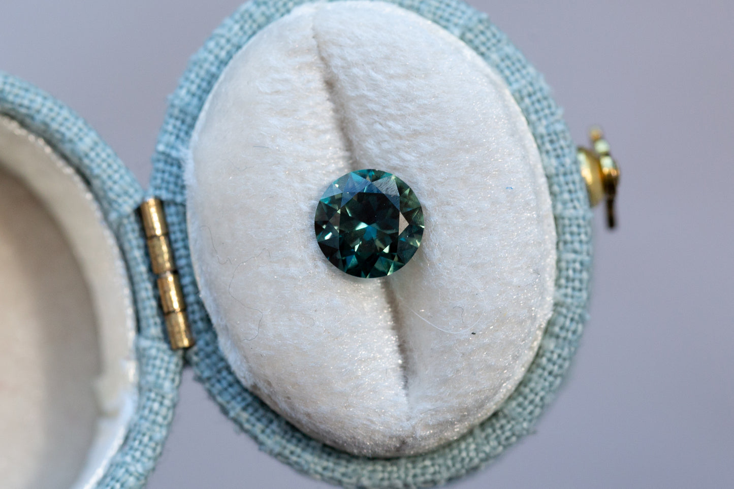 1.34ct Round Deep Teal Green Sapphire