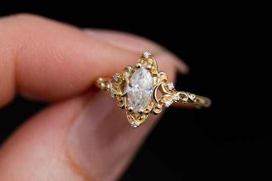 Aurora moon setting with marquise moissanite