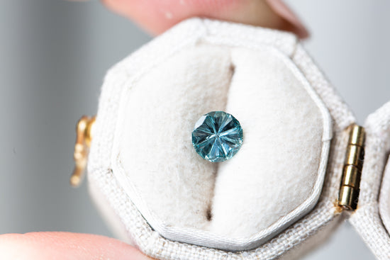 .88ct round Starbrite cut teal blue sapphire