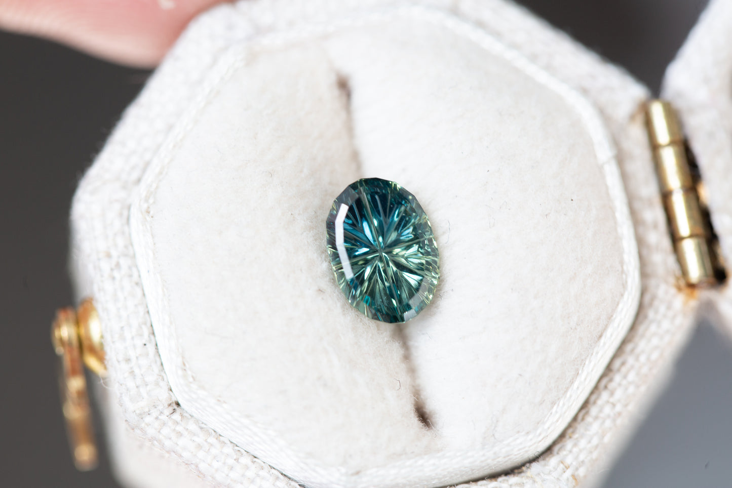 Load image into Gallery viewer, ON HOLD 1.24ct oval Starbrite cut parti blue teal green sapphire
