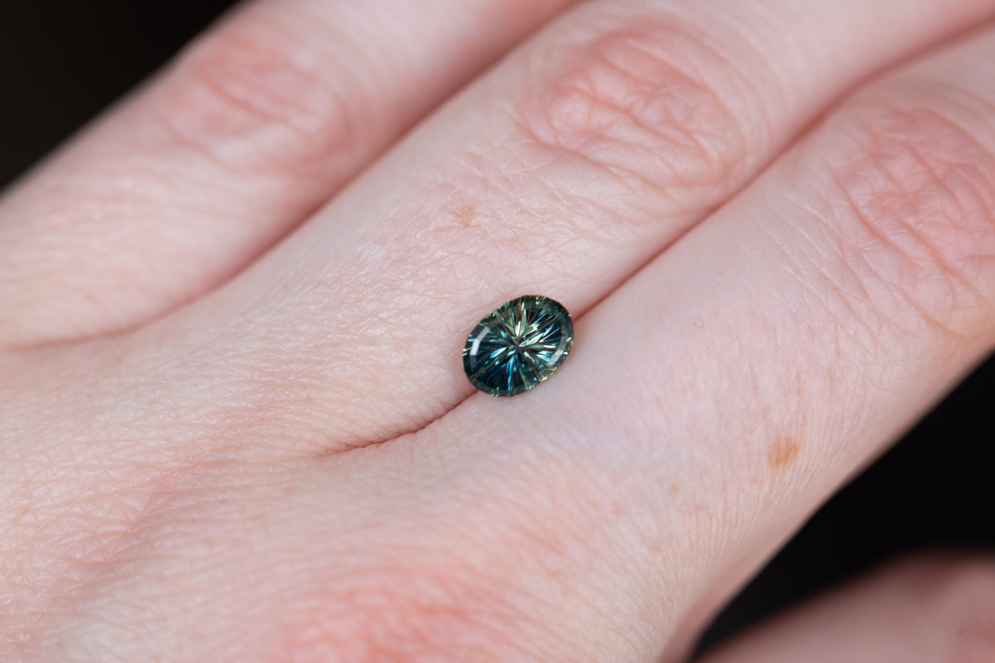 Load image into Gallery viewer, ON HOLD 1.24ct oval Starbrite cut parti blue teal green sapphire

