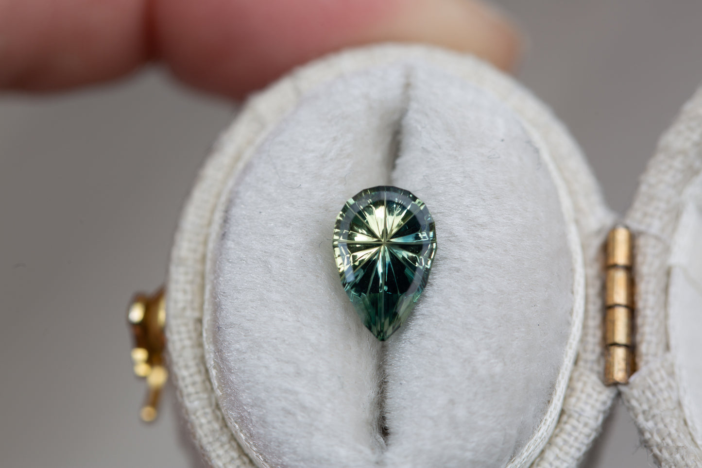 1.61ct pear parti green teal Starbrite sapphire from John Dyer