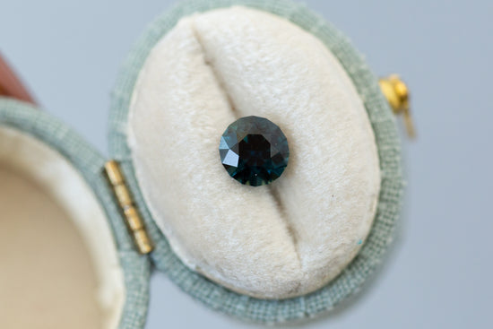 1.55ct Round Dark Teal Sapphire