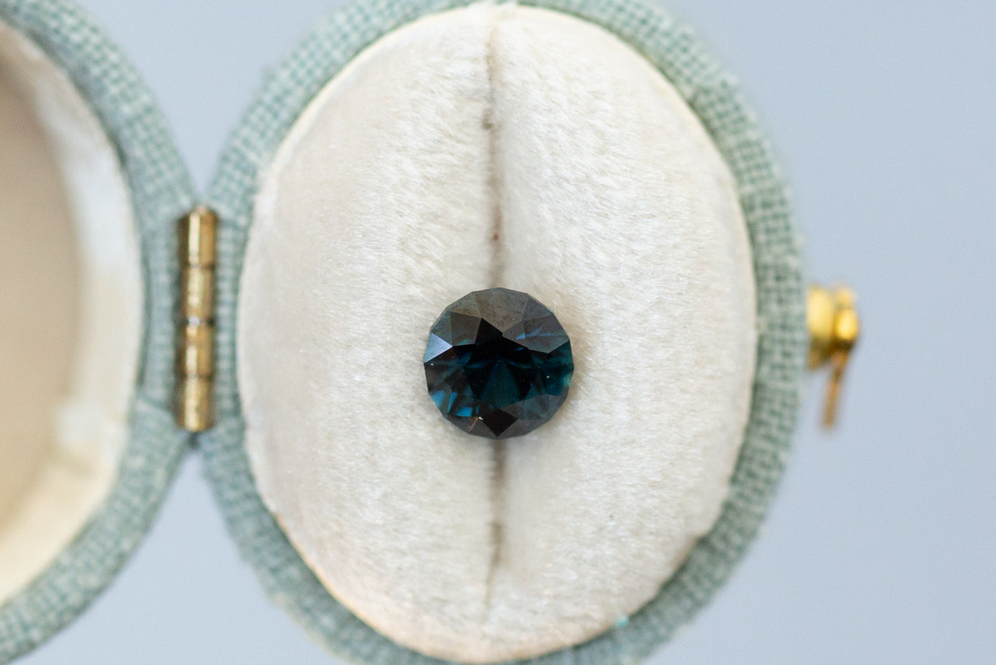 1.55ct Round Dark Teal Sapphire