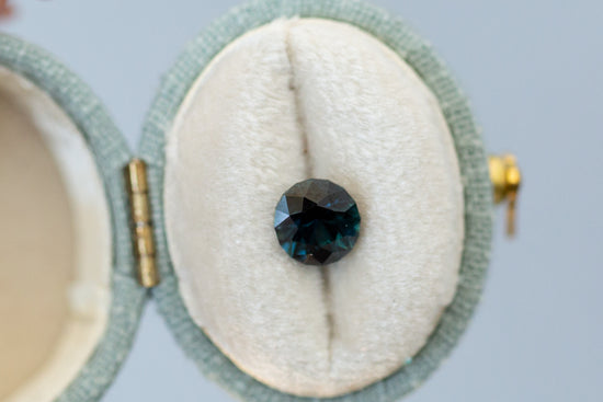 1.55ct Round Dark Teal Sapphire