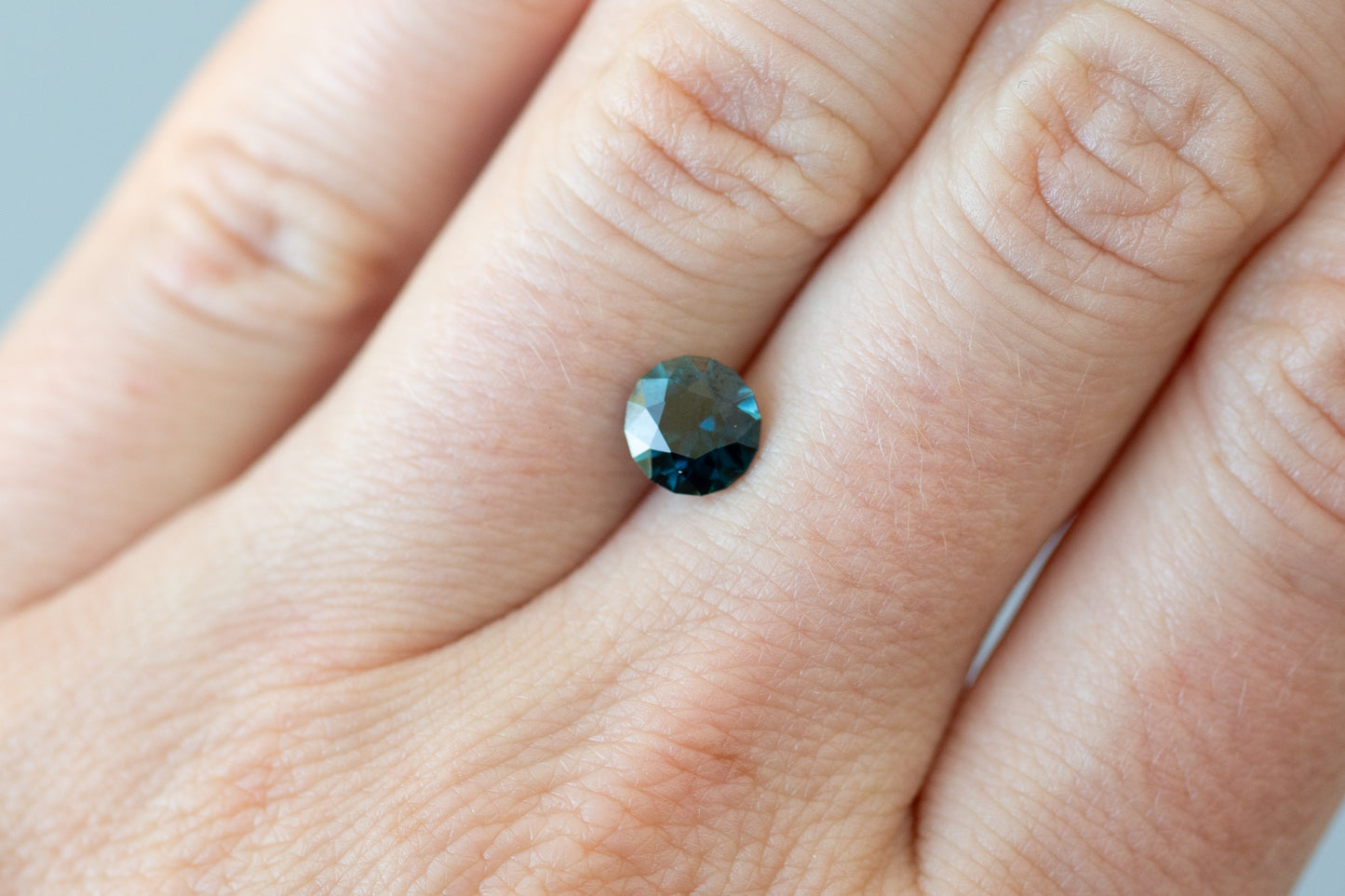 1.55ct Round Dark Teal Sapphire