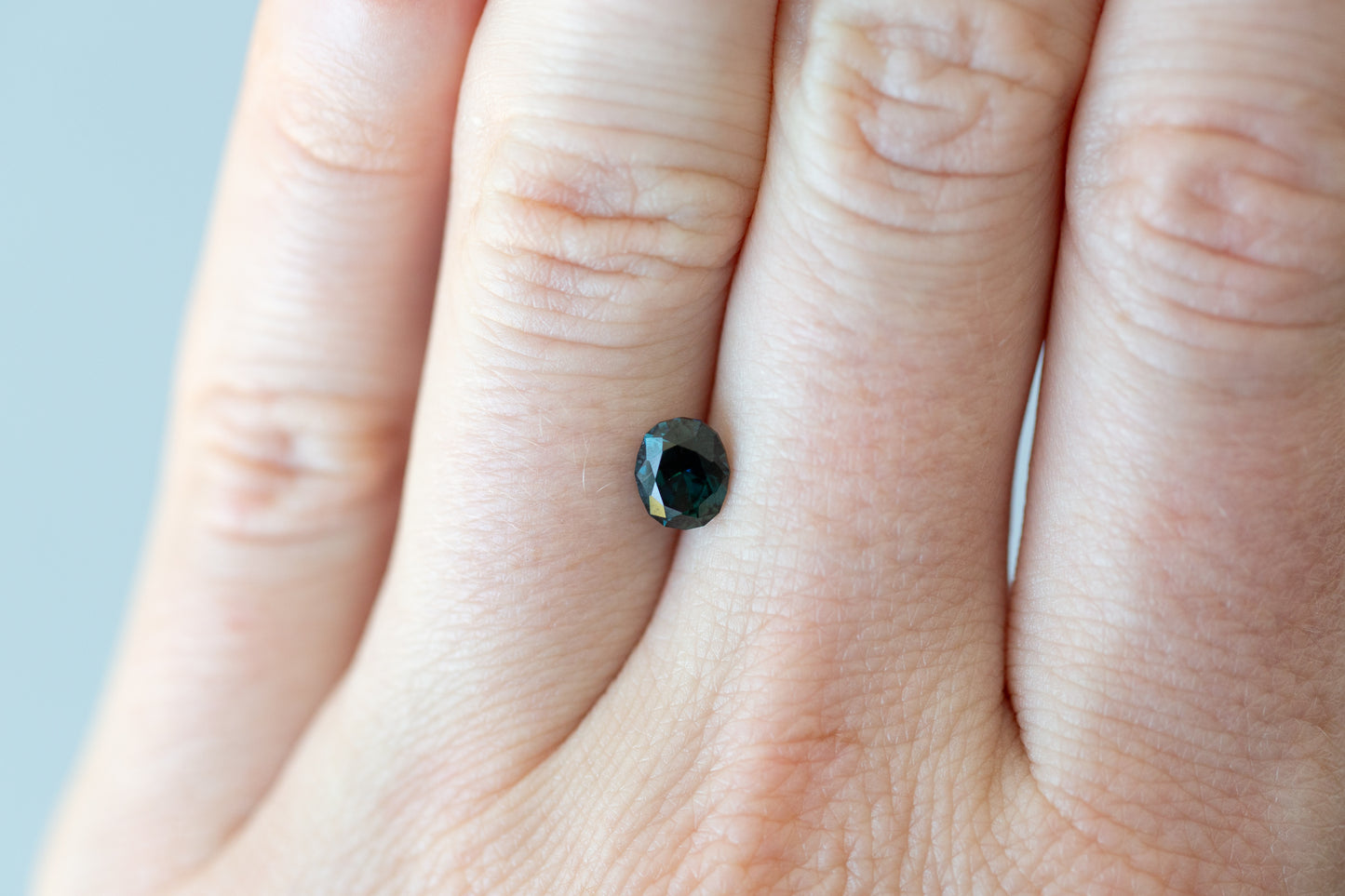 0.88ct Oval Deep Teal Sapphire