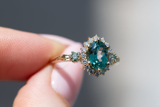 Ash setting with 8x6mm teal green lab sapphire
