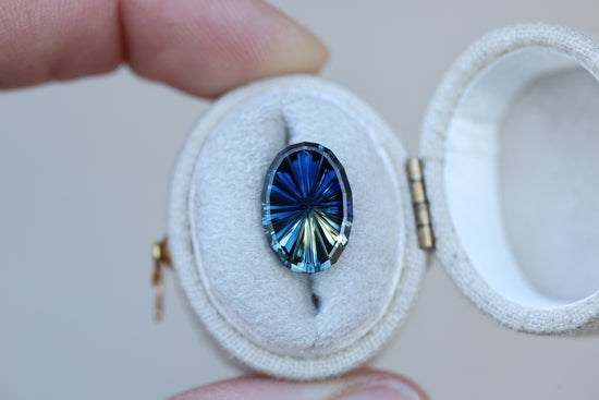 4.45ct oval parti sapphire, Starbrite cut by John Dyer