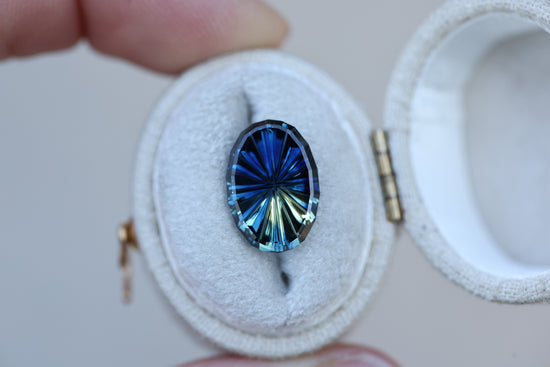 4.45ct oval parti sapphire, Starbrite cut by John Dyer