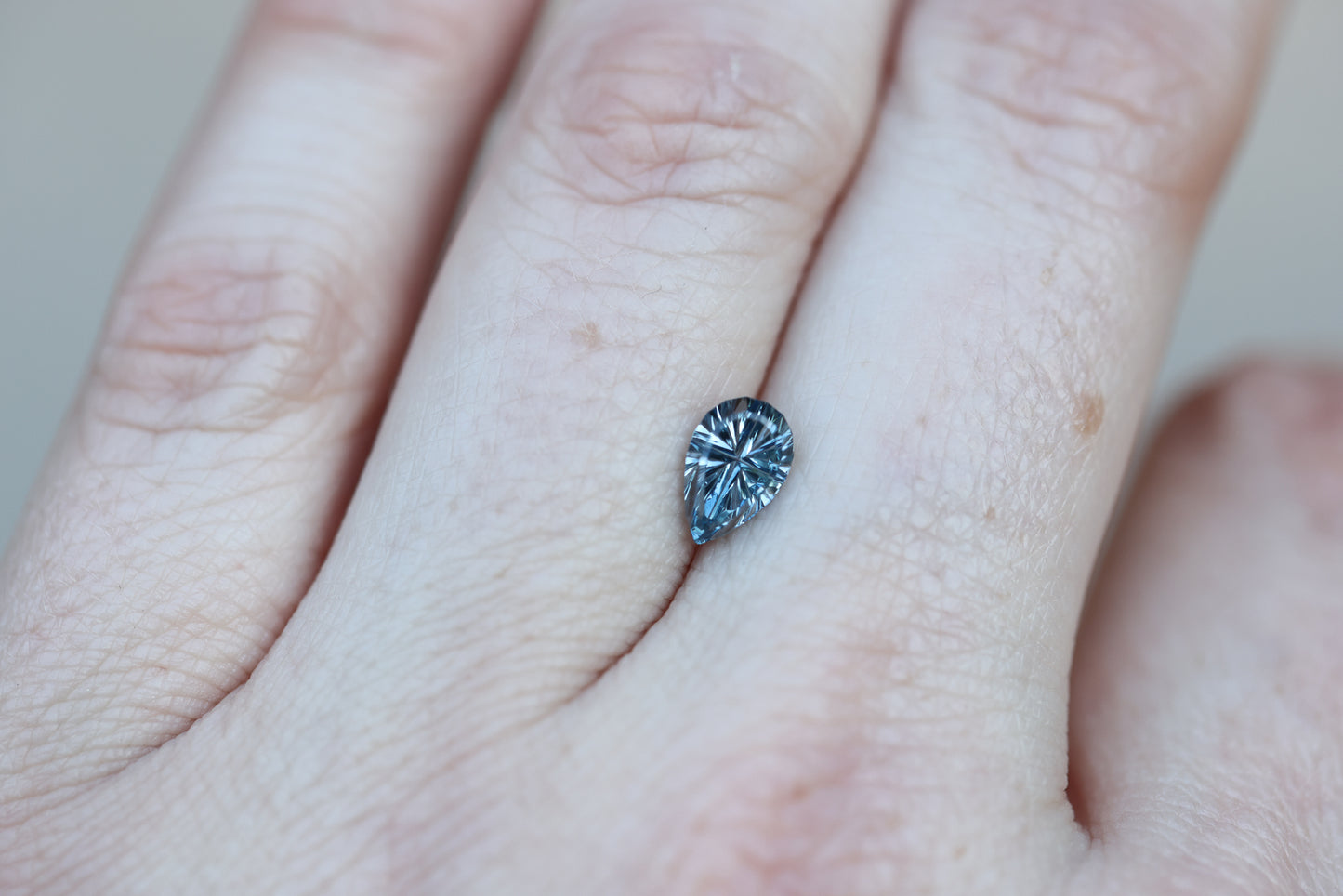 1.12ct pear blue sapphire, Starbrite cut by John Dyer