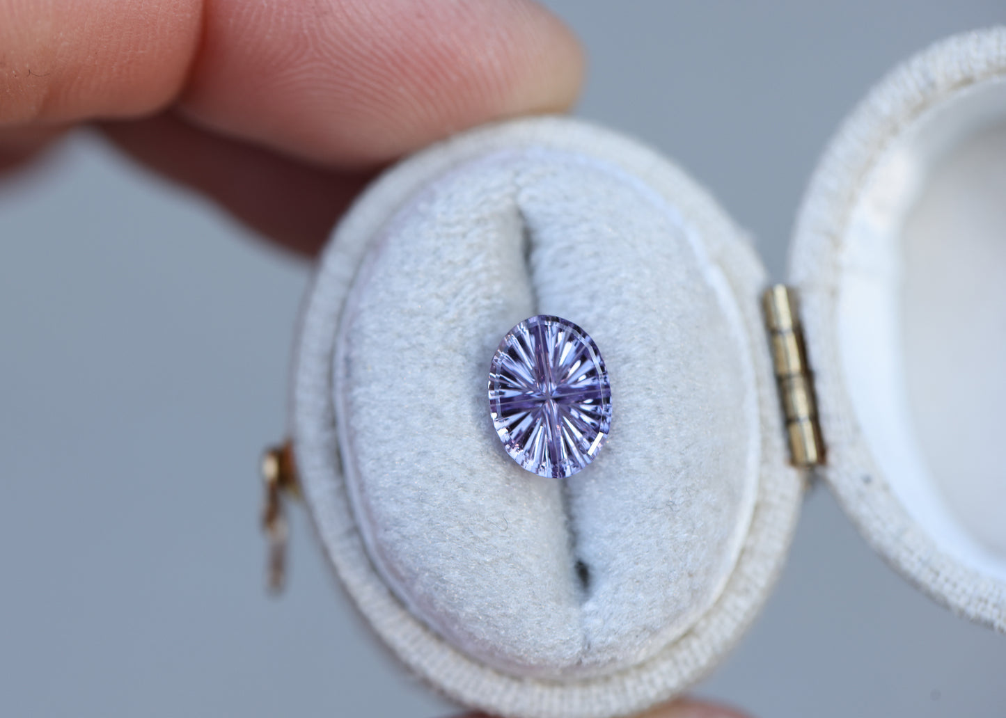 1.36ct oval purple sapphire, Starbrite cut by John Dyer