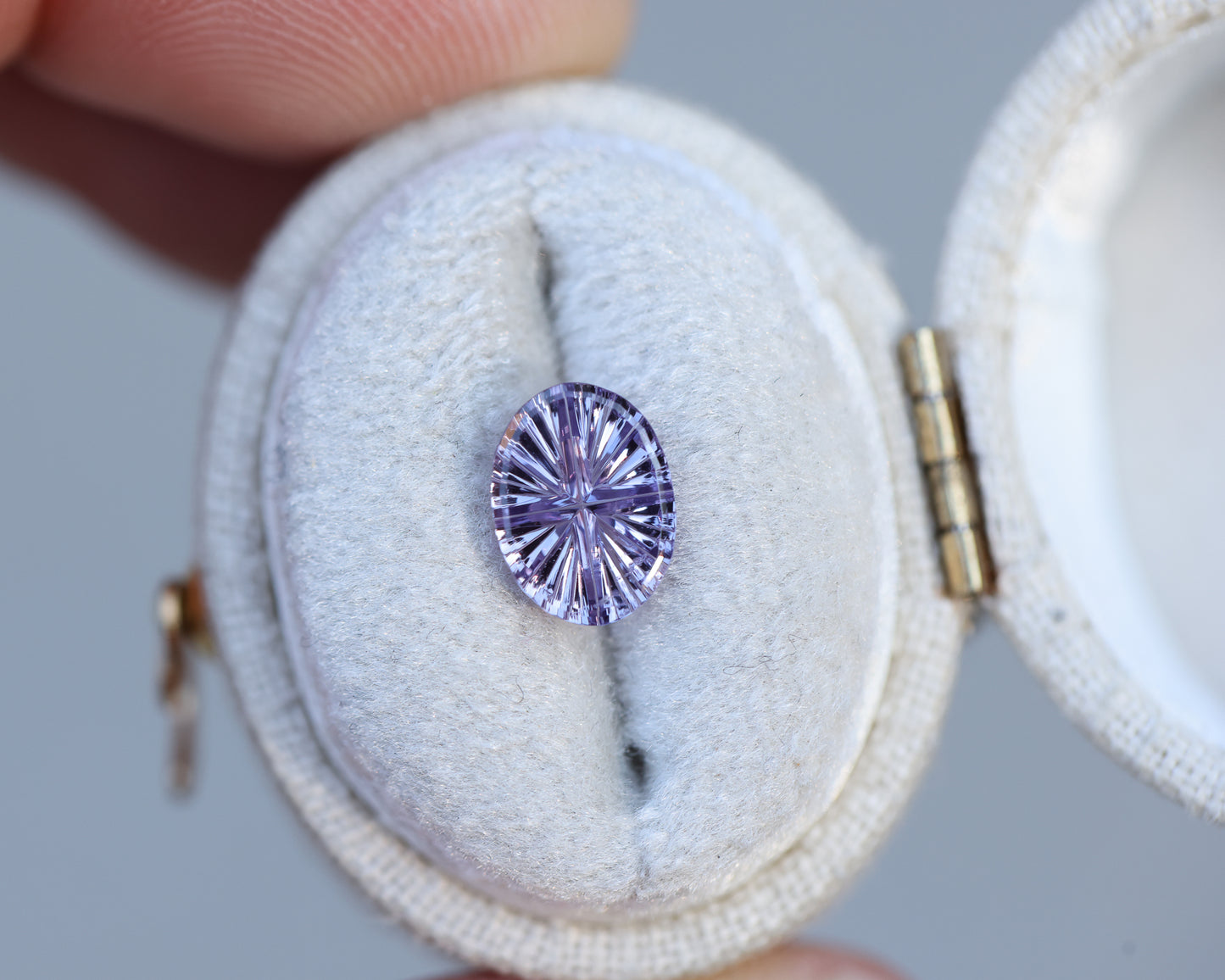 1.36ct oval purple sapphire, Starbrite cut by John Dyer