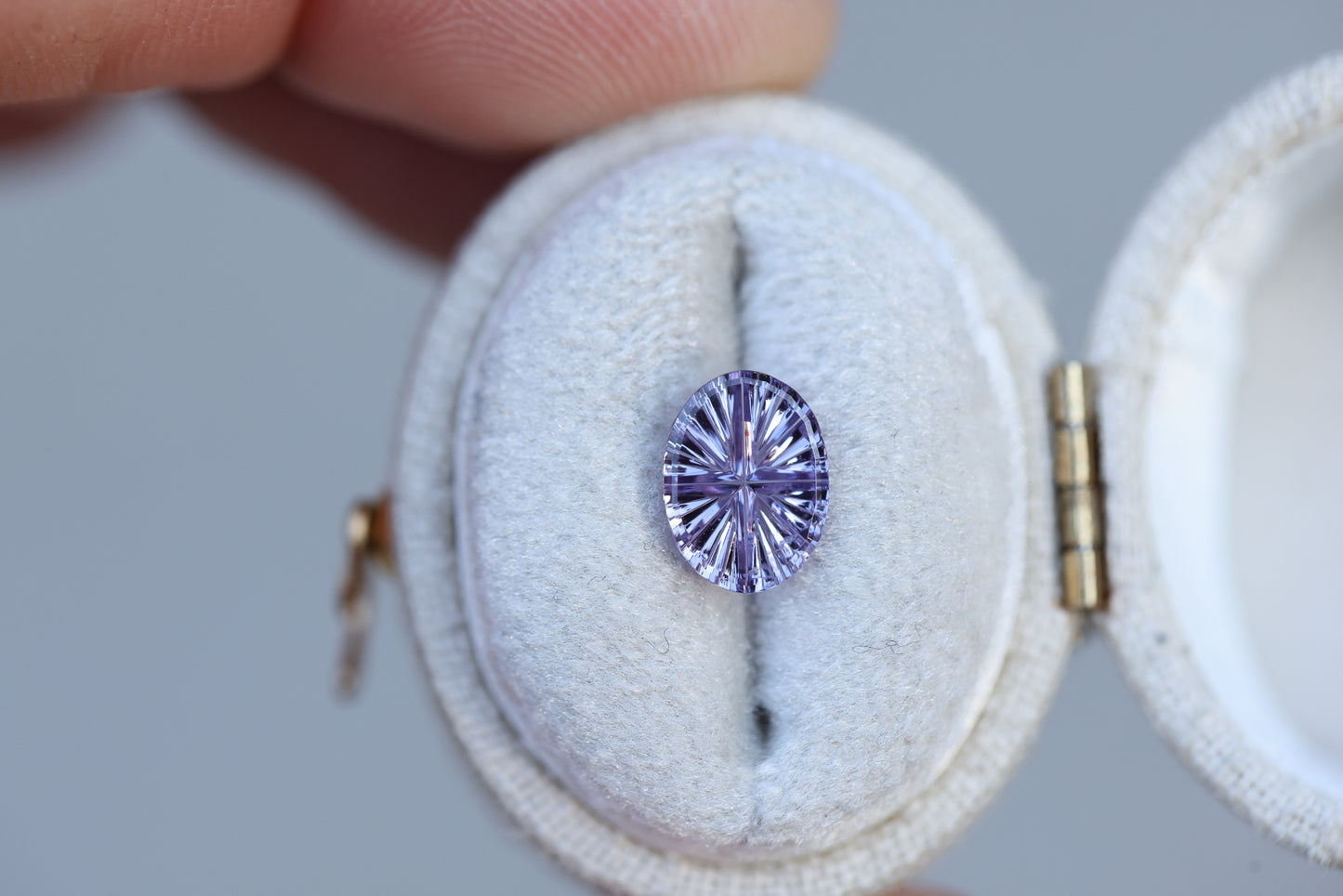 1.36ct oval purple sapphire, Starbrite cut by John Dyer