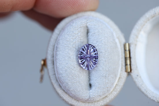 1.36ct oval purple sapphire, Starbrite cut by John Dyer