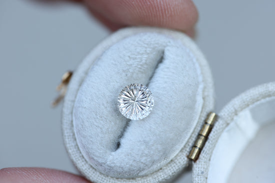 1.94ct round white sapphire, Starbrite cut by John Dyer