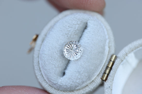 1.94ct round white sapphire, Starbrite cut by John Dyer