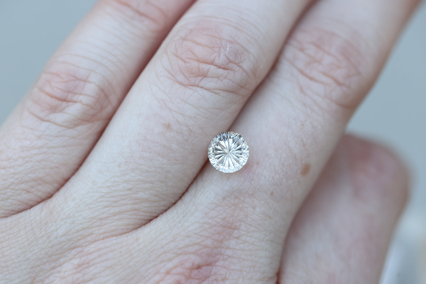 1.94ct round white sapphire, Starbrite cut by John Dyer