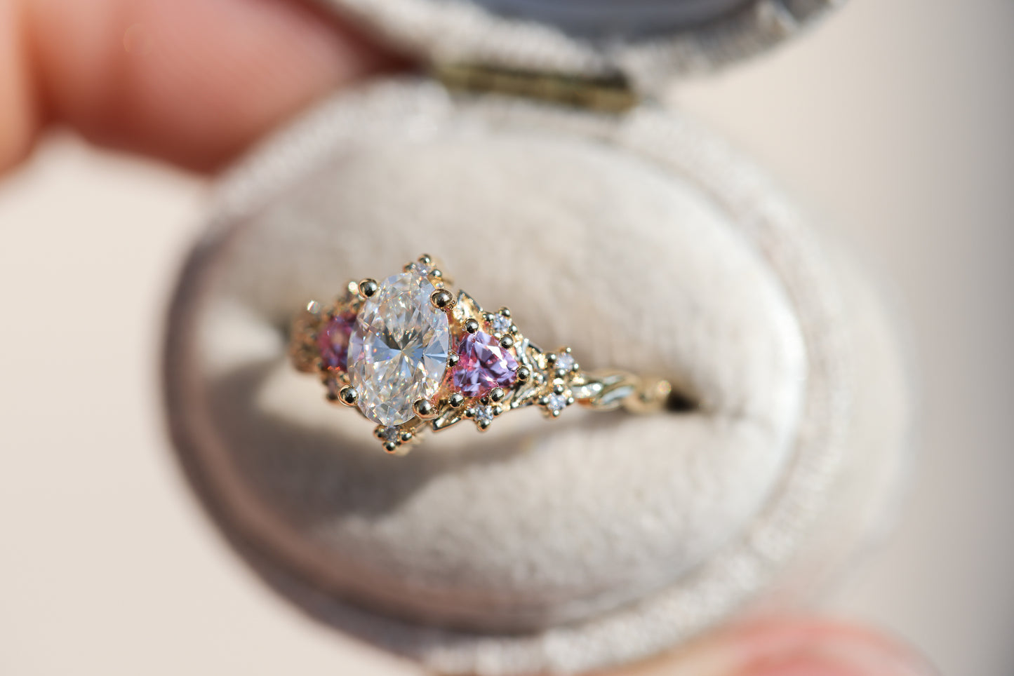 Load image into Gallery viewer, Briar rose three stone with oval lab diamond center and lab pink sapphire sides

