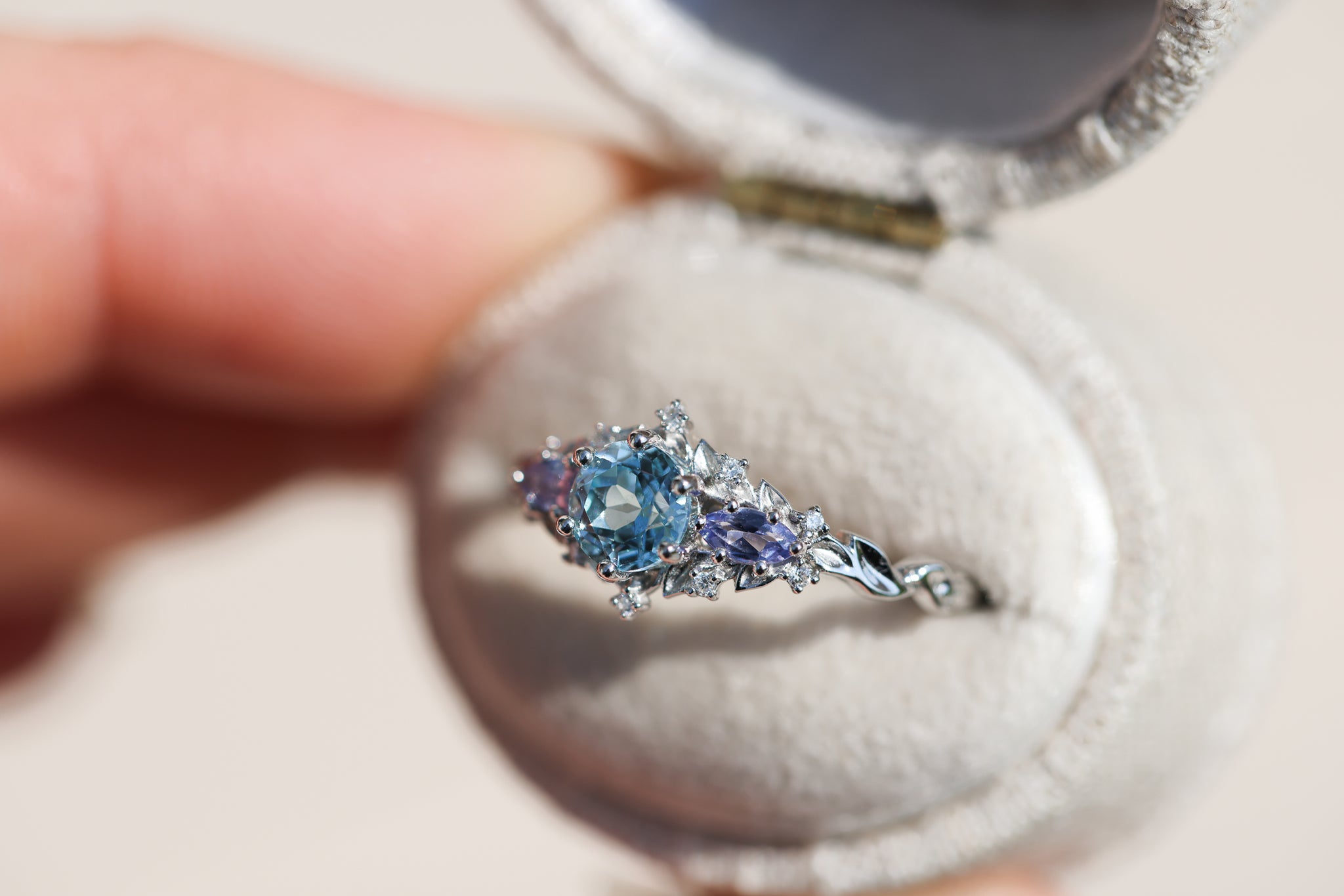 Briar Rose Three Stone with round aquamarine center and marquise