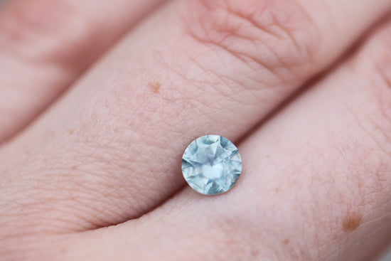 1.26ct round opaque teal blue sapphire