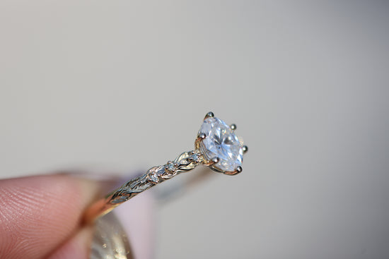 Ready to ship, size 11 14k yellow Rowan setting with oval moissanite