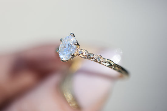 Ready to ship, size 11 14k yellow Rowan setting with oval moissanite