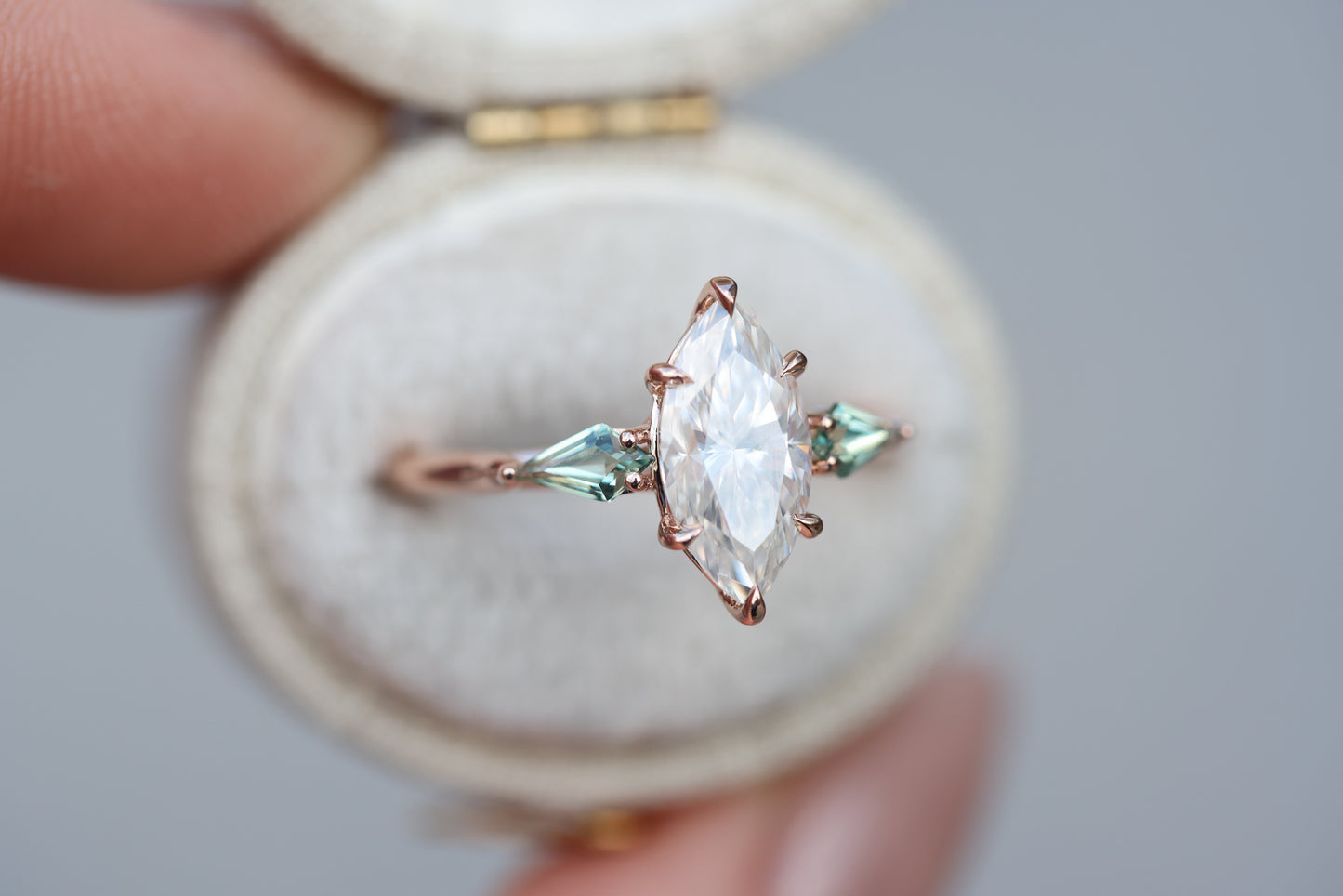 Artemis with marquise moissanite and lab green sapphire