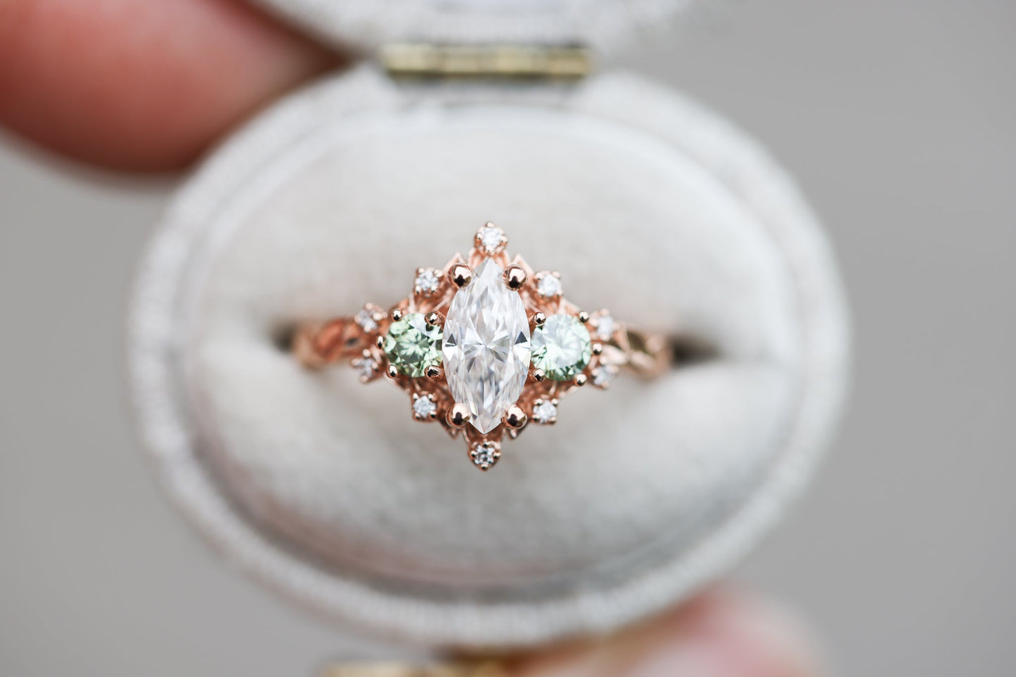 Customize your own Briar rose three stone with marquise center and round sides