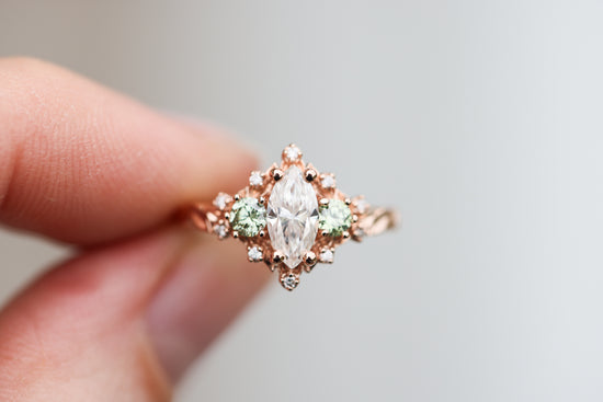 Briar rose three stone with marquise moissanite and mint green diamonds